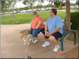 Aunt Giliane & Uncle Jeff rest on a bench with Keeley